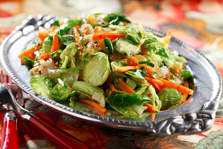 Sauteed Brussels Sprout Slaw with Carrots and Golden Raisins | www.canolaeatwell.com