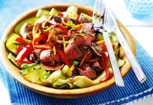 citrus beef on zucchini ribbons | www.canolainfo.org